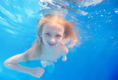 female nude swimming